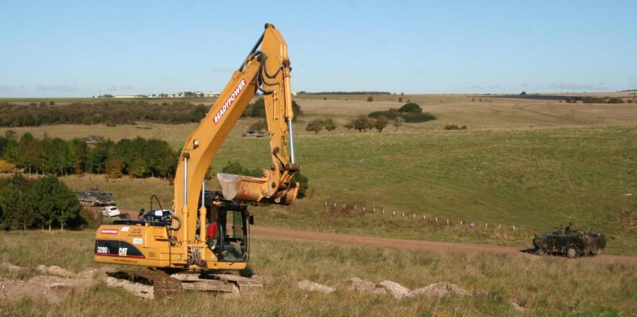 Digger excavating a trench