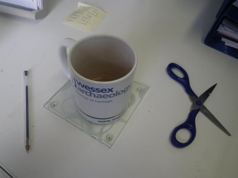 Company mug on a desk