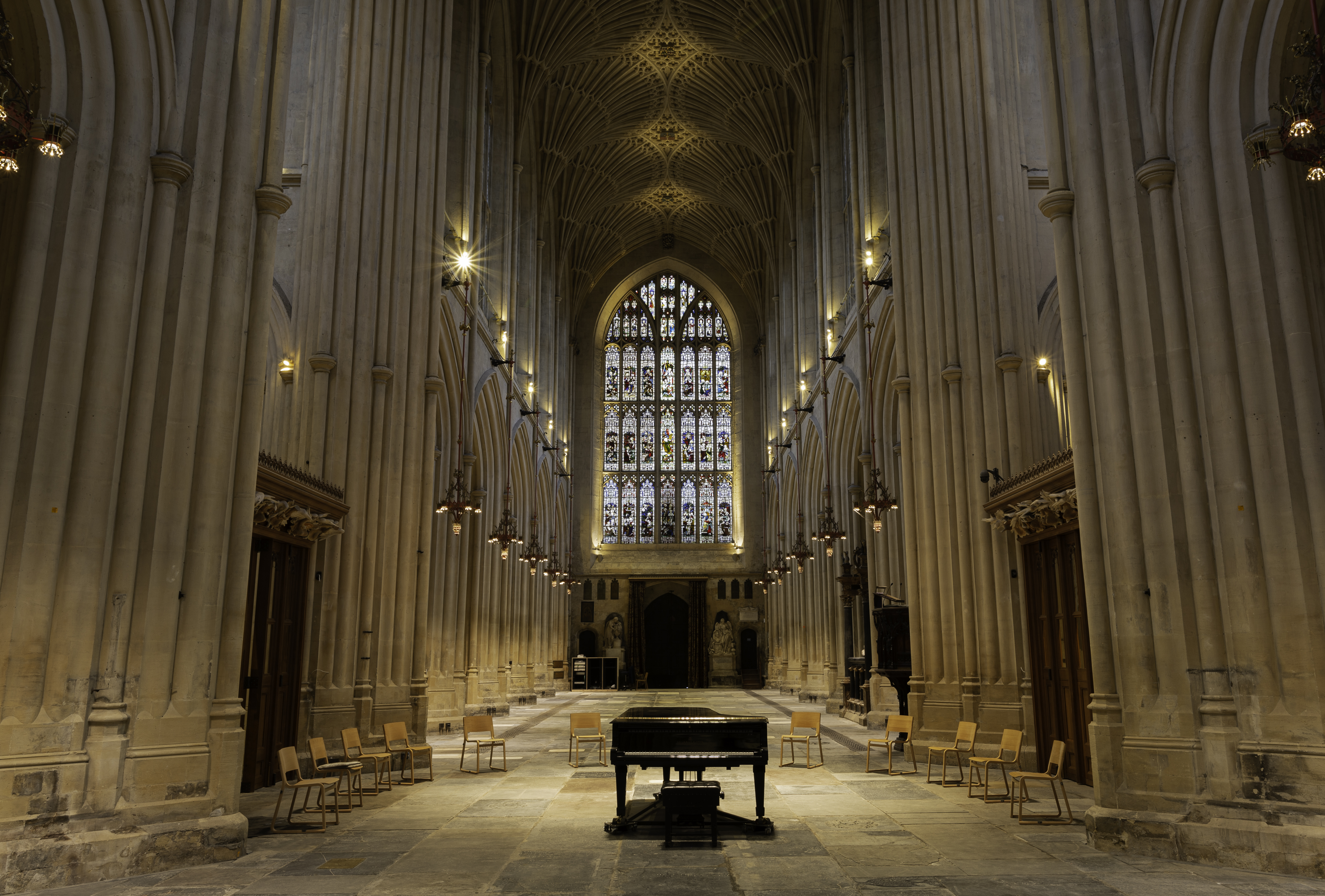 Inside Bath Abbey, vaulted stone columns form a serene and majestic Abbey Interior