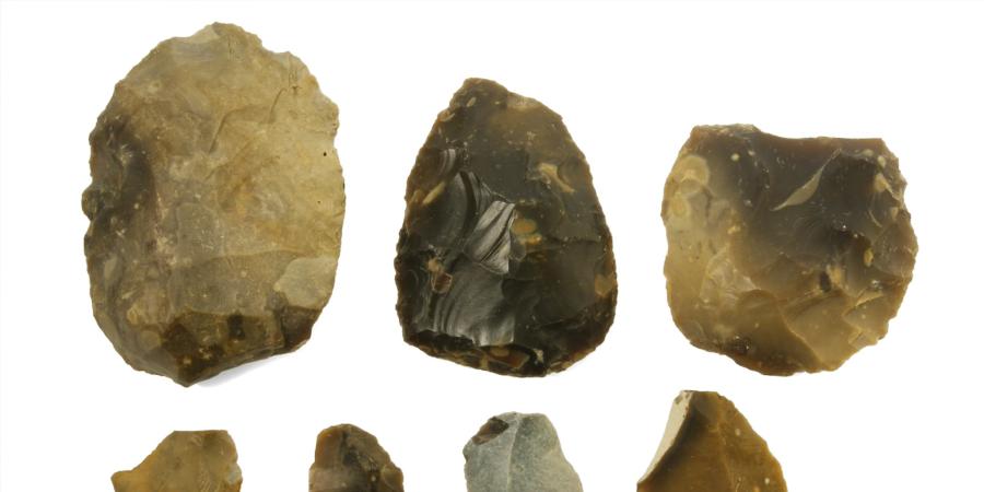 Flint handaxes on a white background