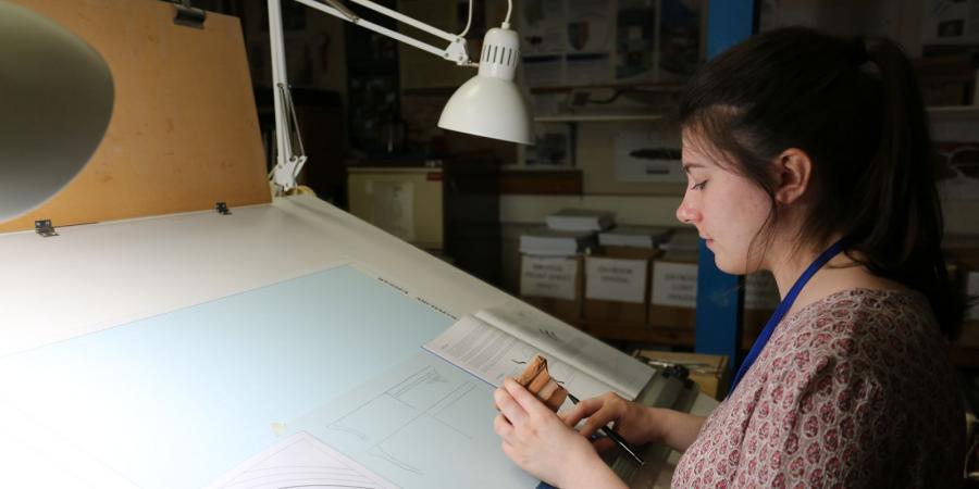 Rachel drawing a pottery sherd