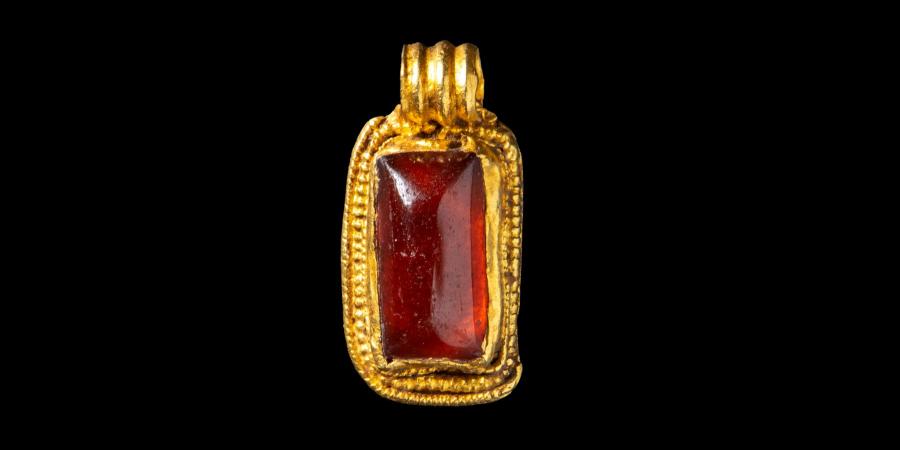 An Anglo Saxon garnet pendant found during Viking Link excavations.