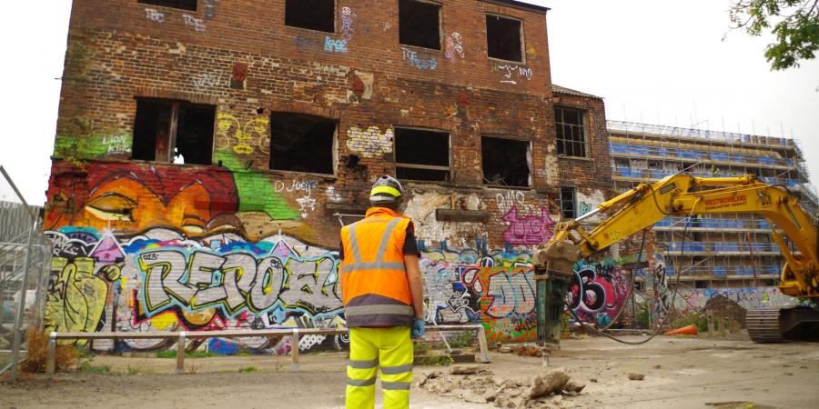 A digger excavating at the former Porter Island Works