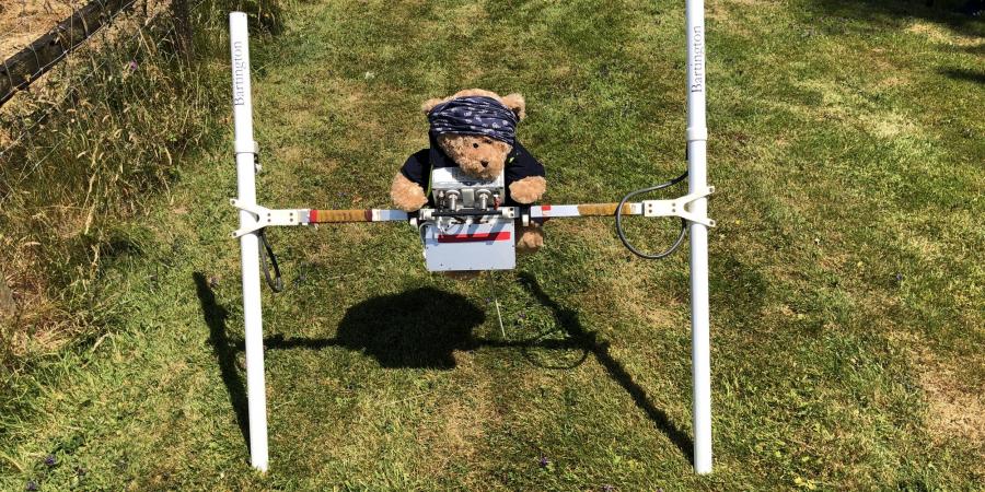 Kent Jones carrying out a magnetometer survey