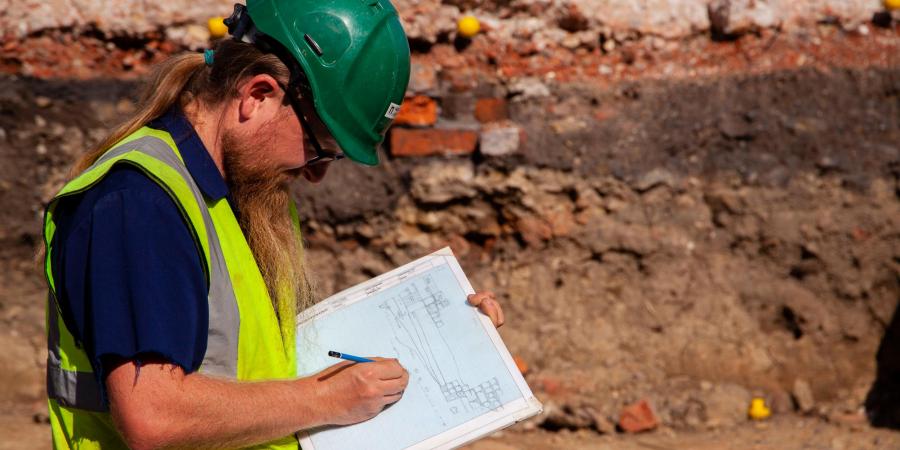Archaeologist recording a section on Sheffield Castle site