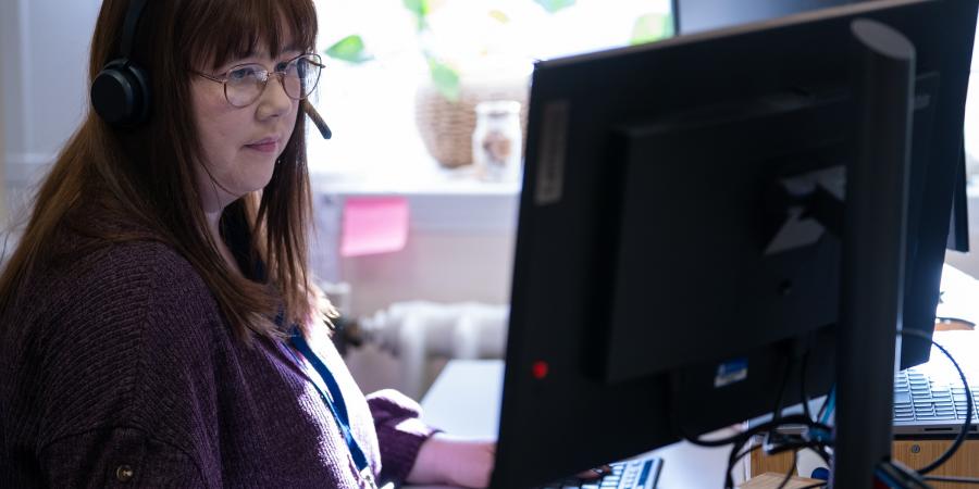Colleague working at a desk