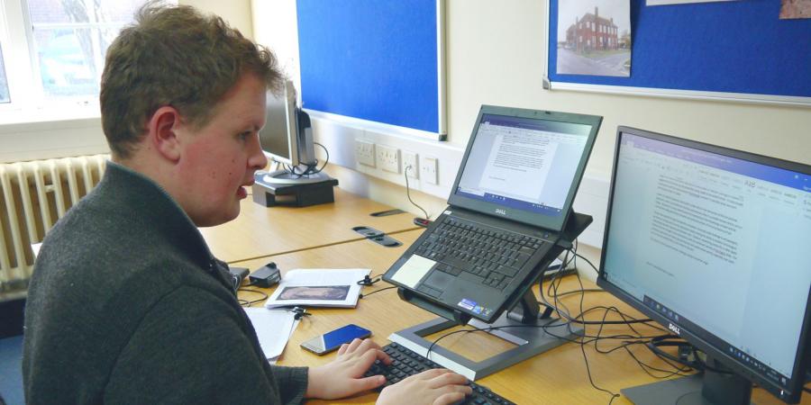 Finn working at his computer