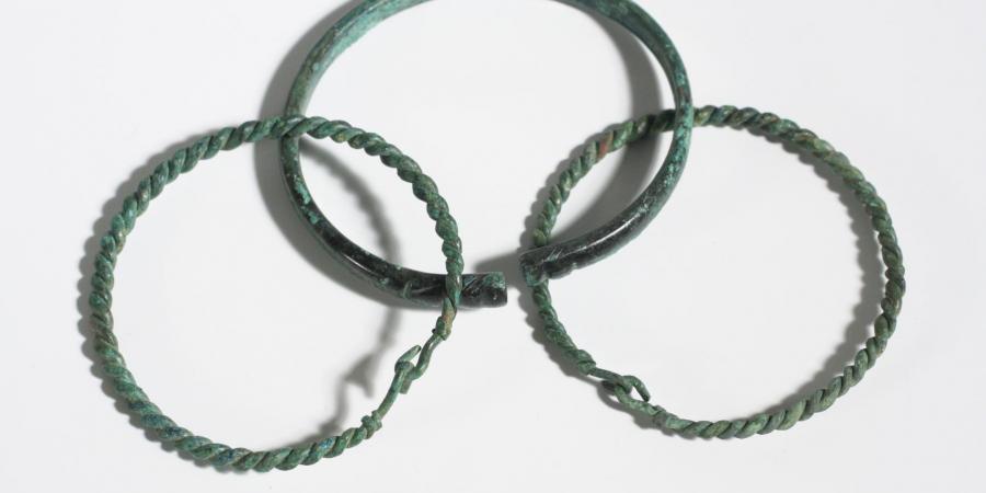Three Romano-British copper alloy bracelets from Poundbury Farm