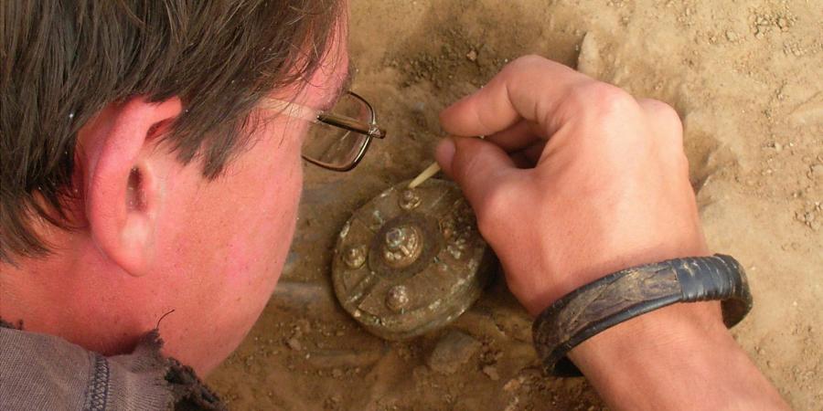 Carful excavation of a Saxon brooch