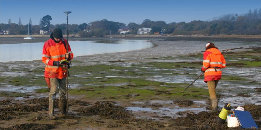 Intertidal fieldwork, undertaking an auger survey on the coast
