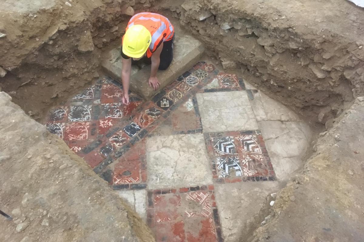 Medieval floor tiles being recorded at Bath Abbey