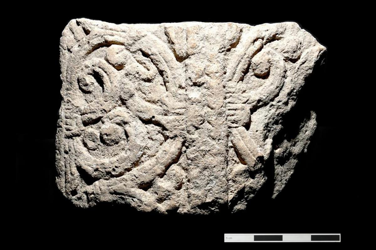 Late Saxon carved stone reused as medieval grave cover