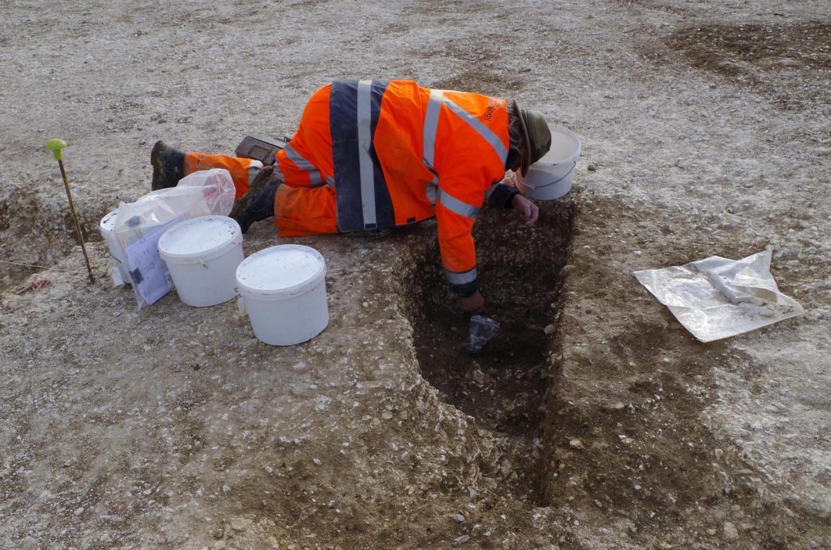 Excavating a Neolithic pit at Bulford