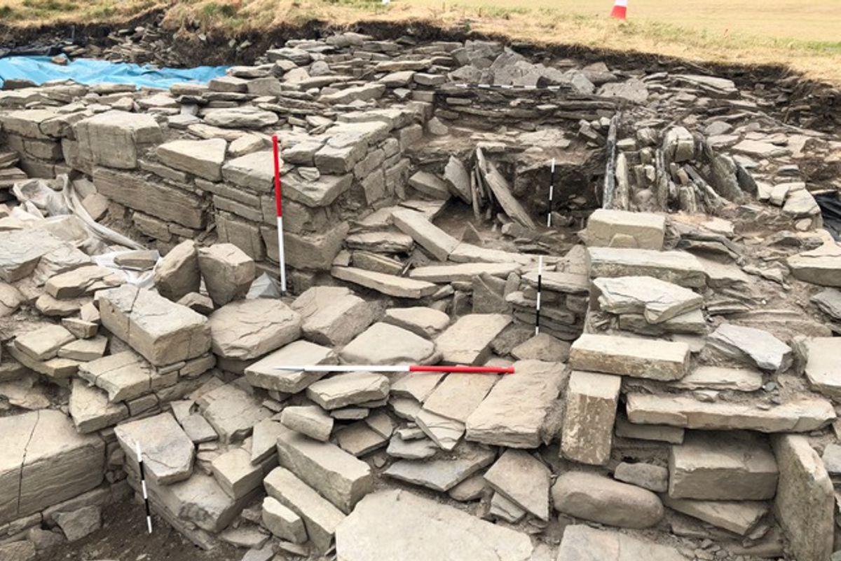 Cairn with structures butted up against it