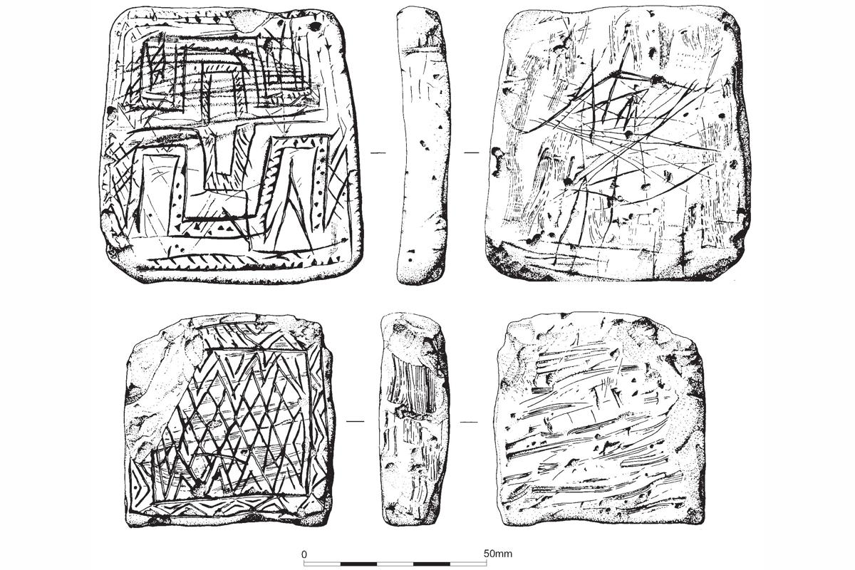 Decorated chalk plaque found in a Late Neolithic pit on King Barrow Ridge