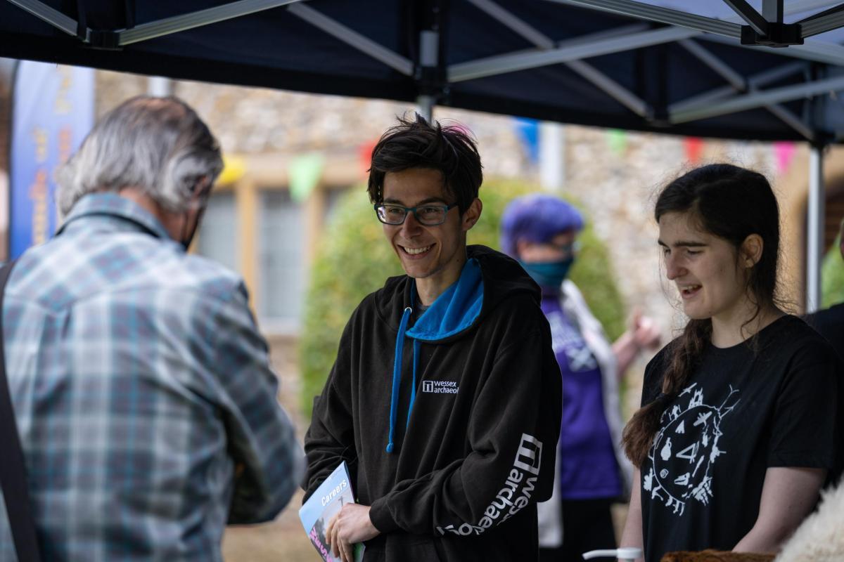Lizzie Garwood and Jono Sutton interacting with the public at Salisbury Museum