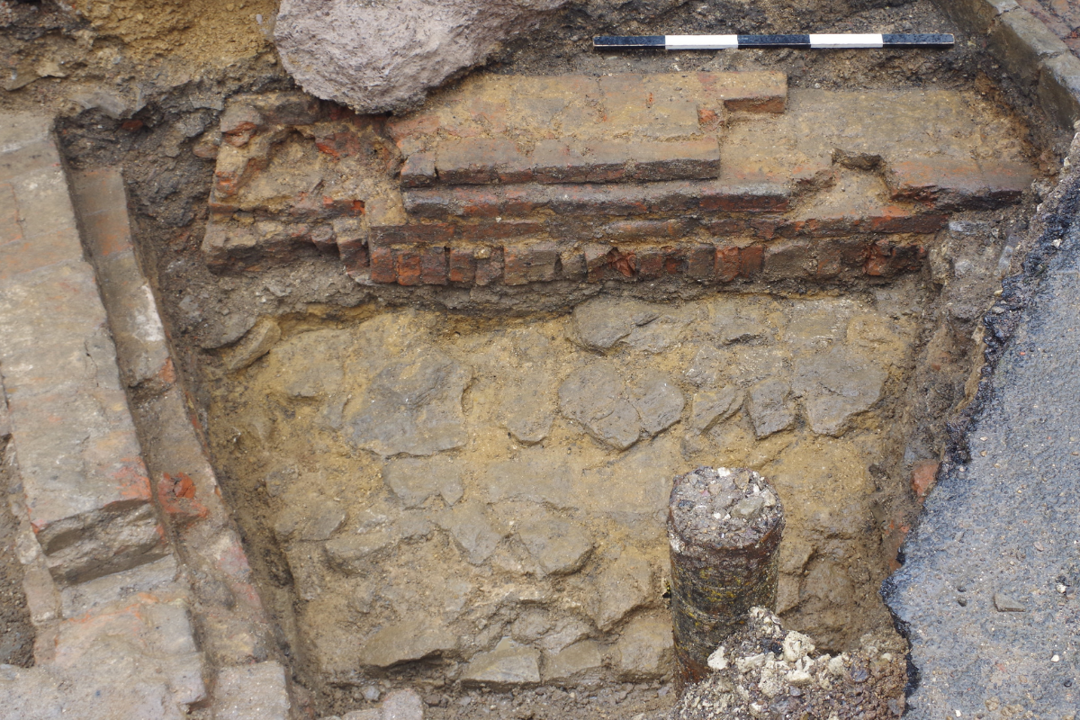 Medieval wall to the north of the keep and foundations of a possible c.1650 bridewell, cut by the wall of a late 18th-century exercise yard