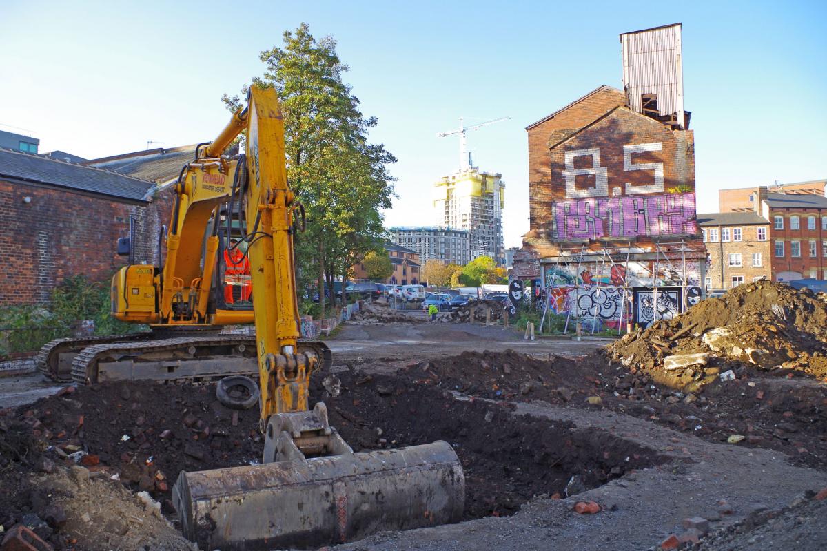 A digger excavating at the former Porter Island Works