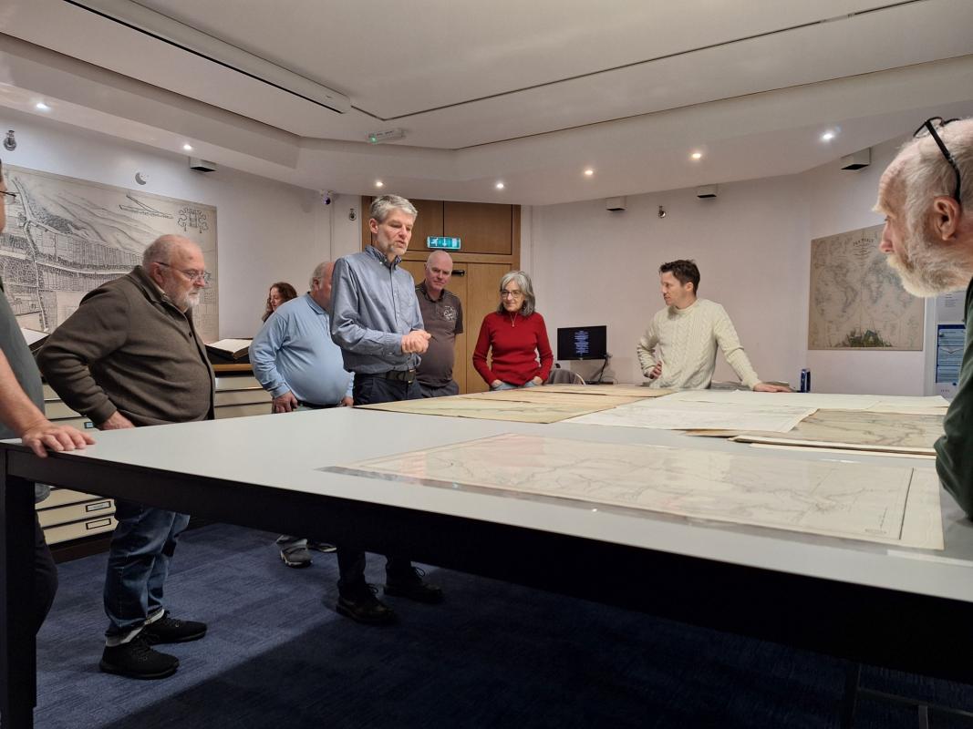 Participants review maps