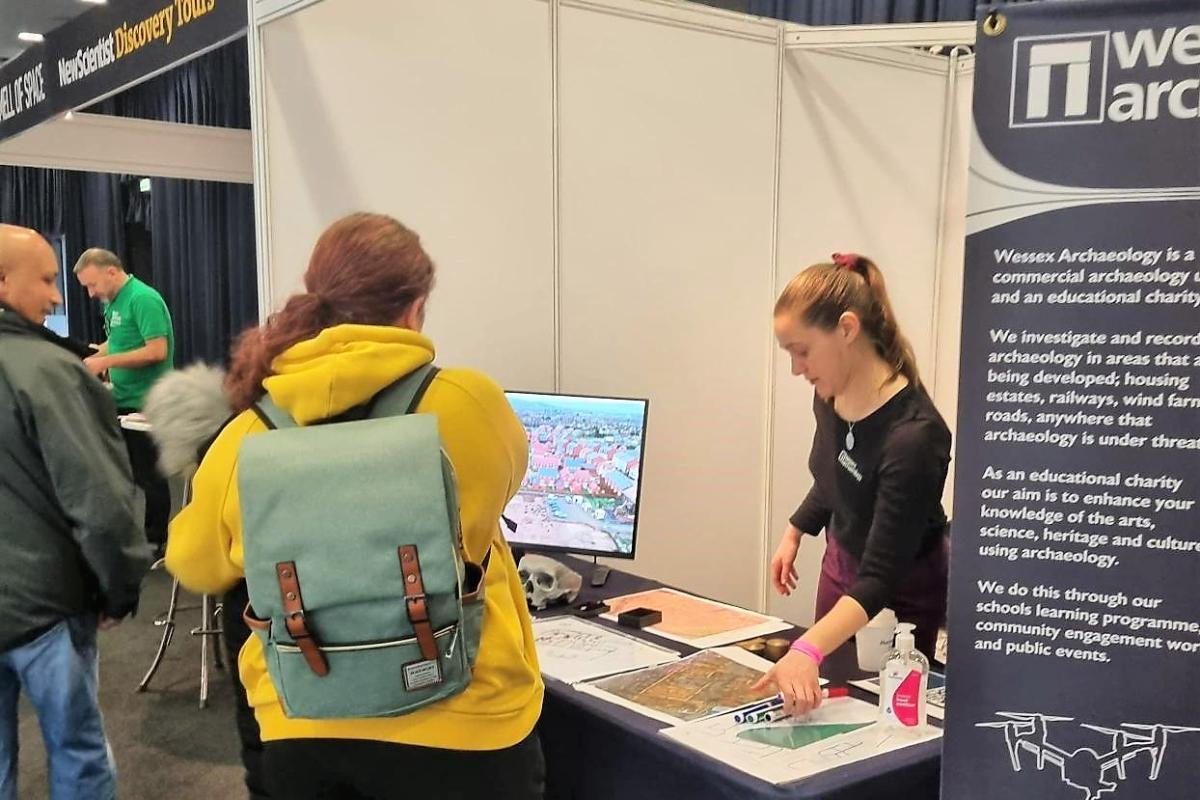 Natasha Bramall, Community and Education Coordinator, at the Wessex Archaeology New Scientist Live North stand