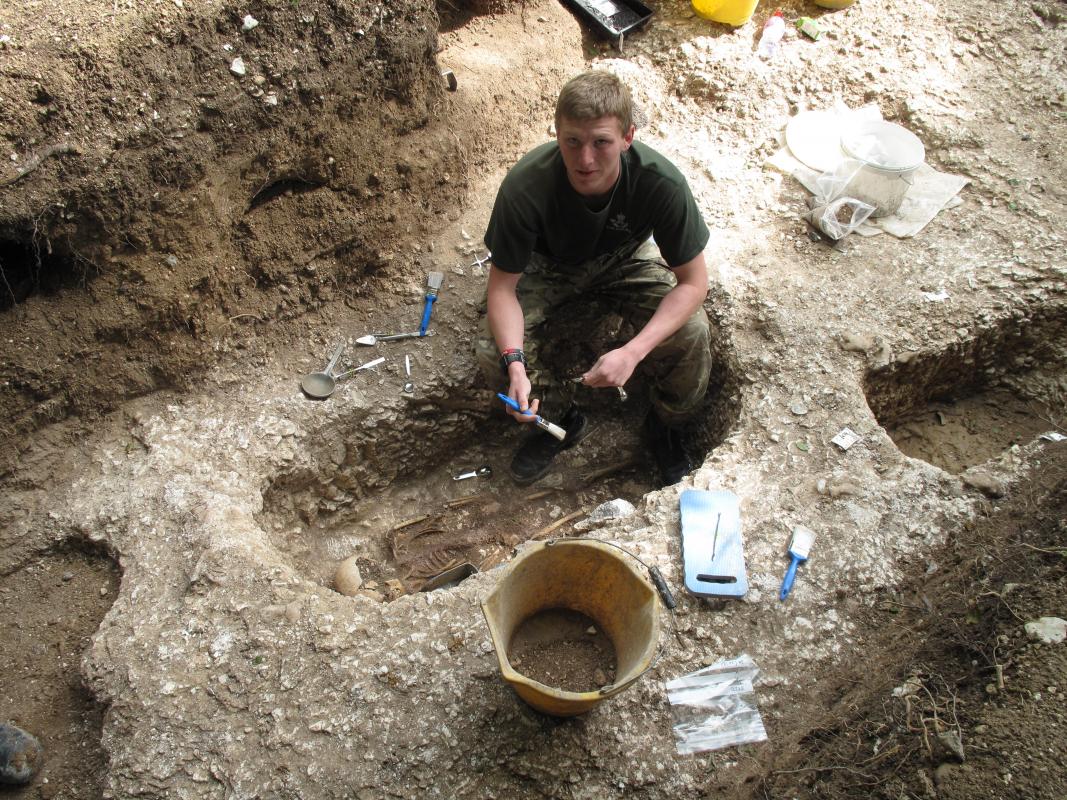 Service personnel excavating a Saxon burial