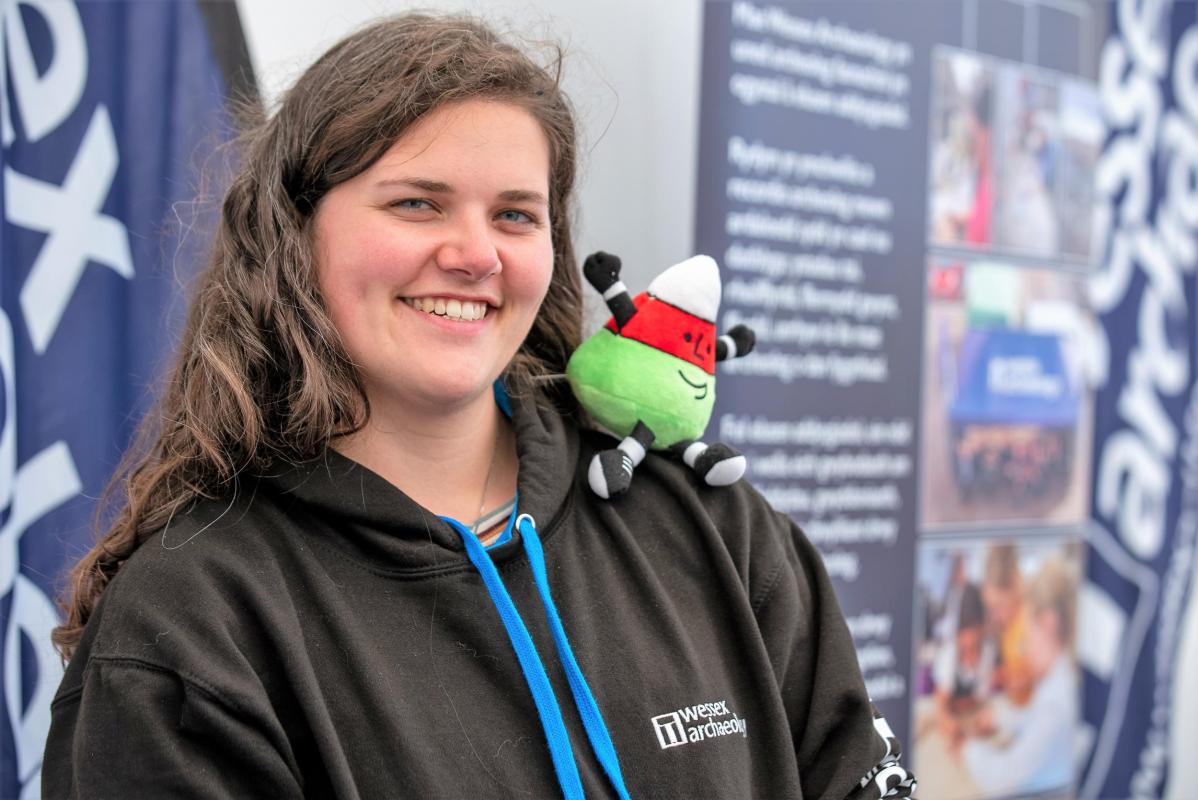 Beth Harrison, Community Engagement Coordinator, with Eisteddfod yr Urdd mascot 