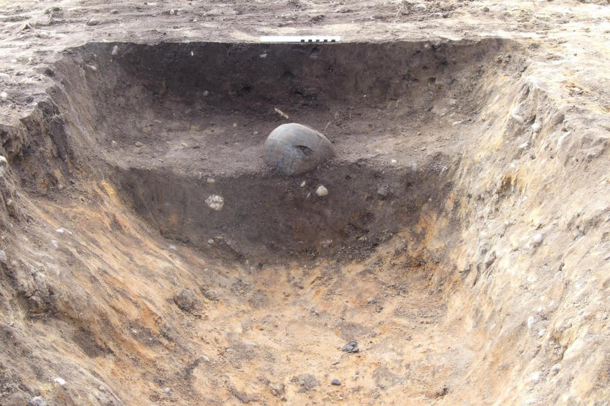 Remains of a pot within a trench