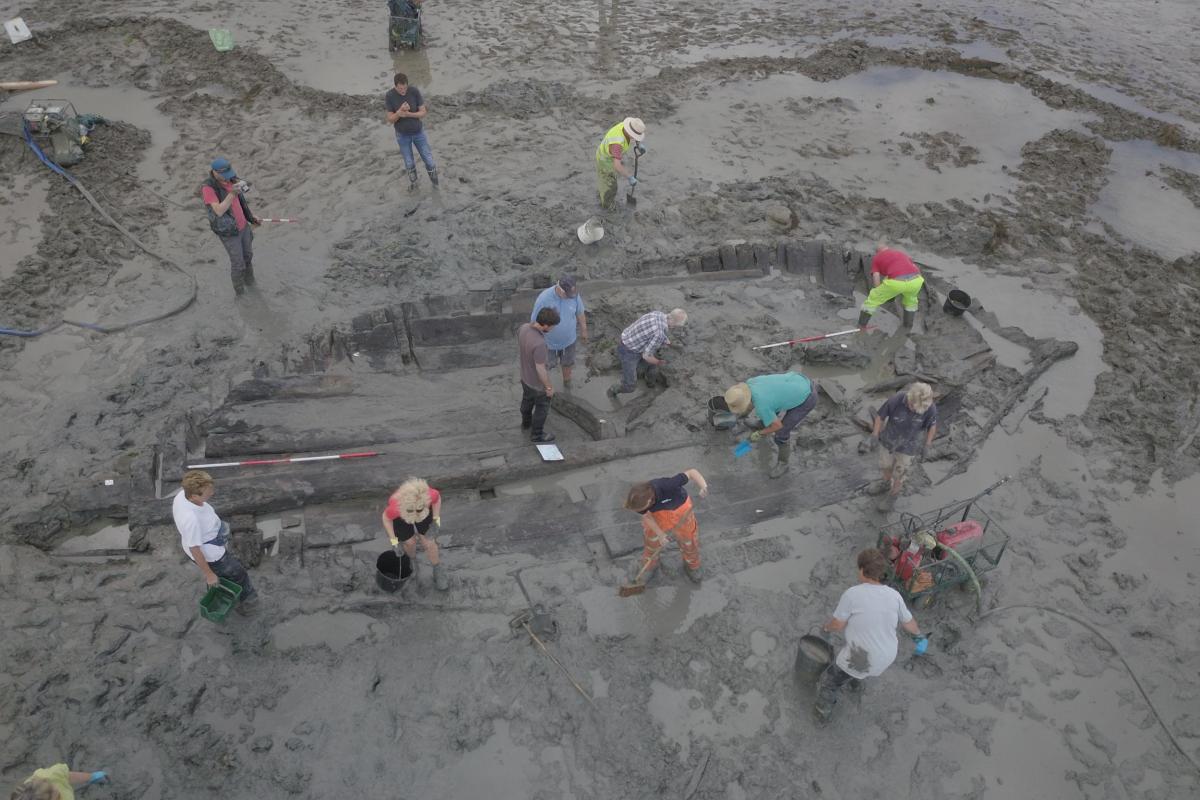 Aerial photo of people working on the Tankerton wreck, by Tom Banbury
