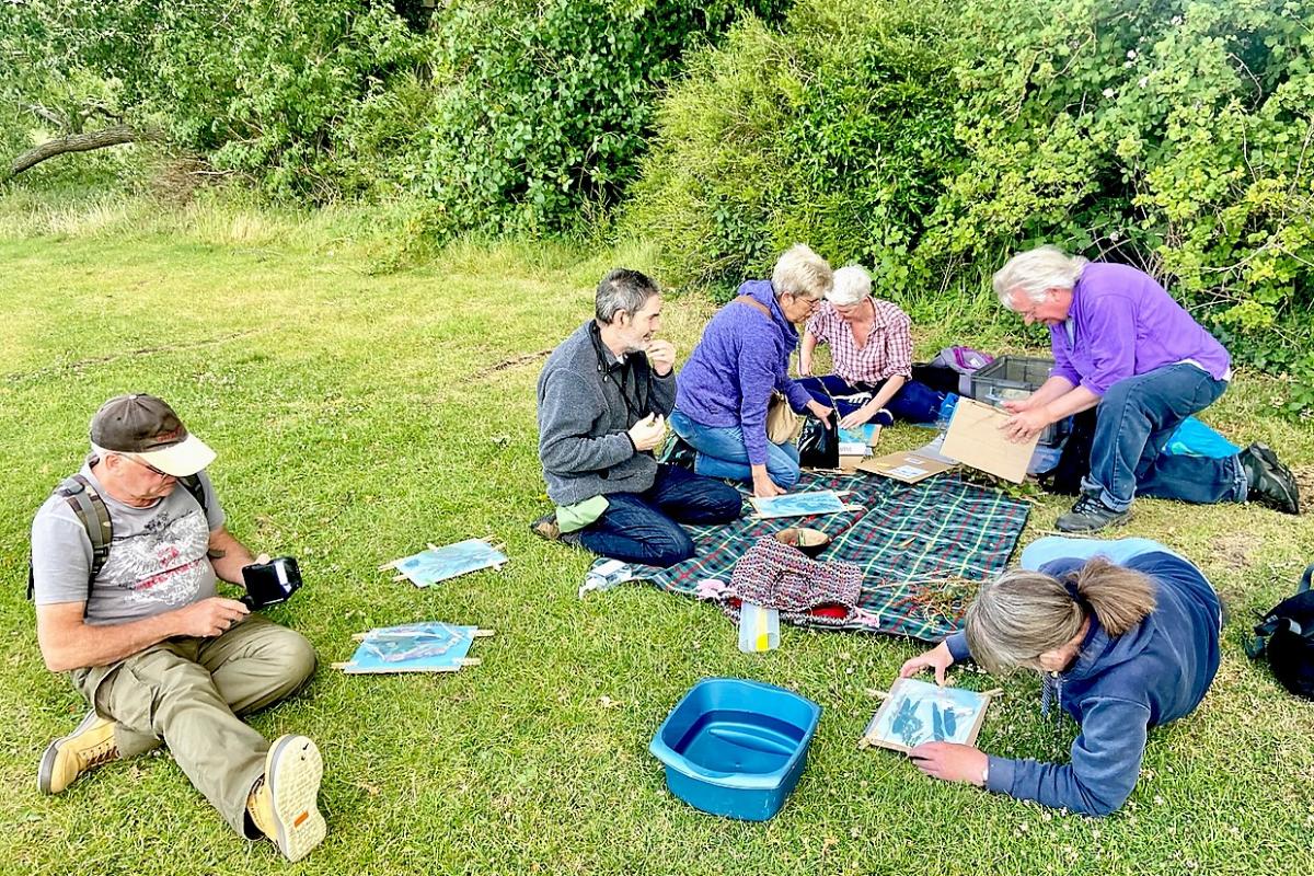 The Ripple Effect participants gathered by the River Avon to discuss the project