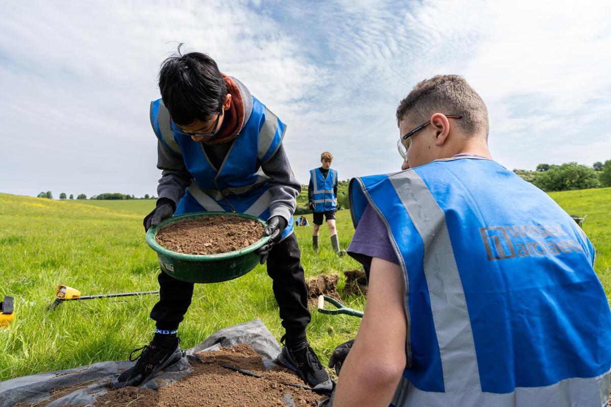 Historic England's Rejuvenate Project. Sieving. Coombe Bissett Down Nature Reserve, Wiltshire.