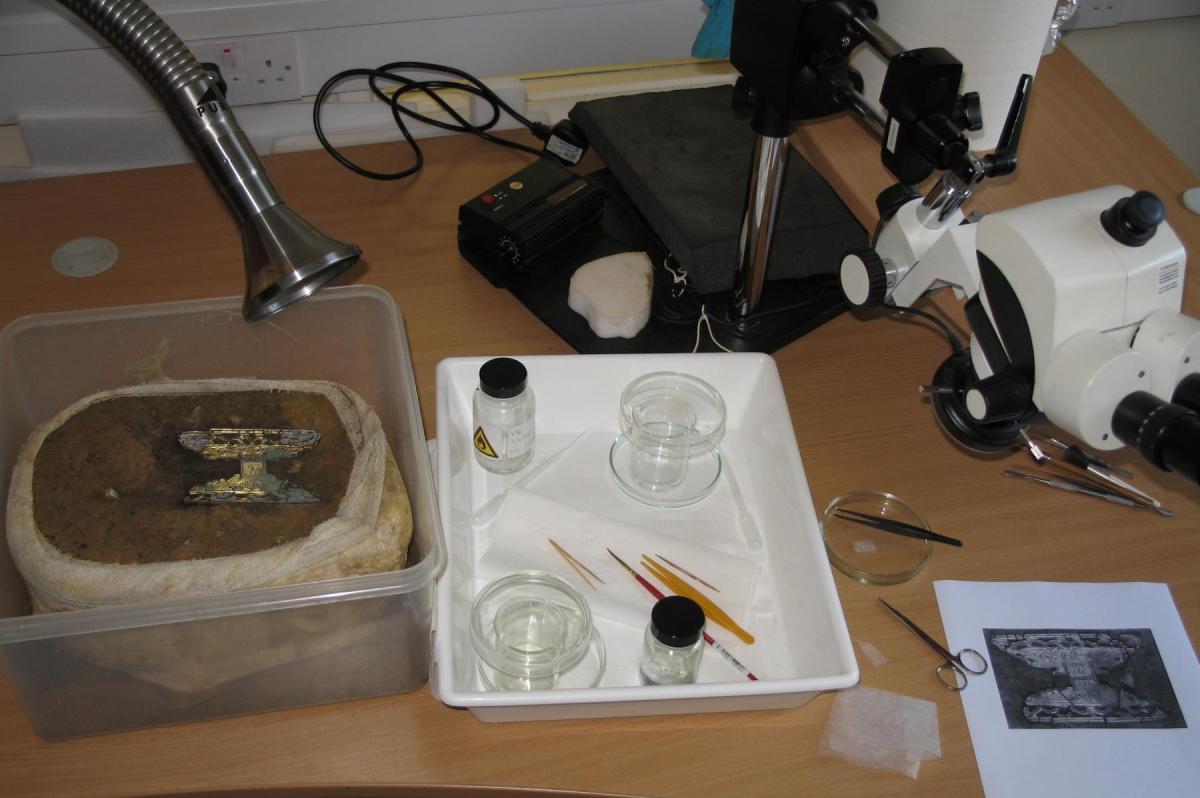 Conservation work on the brooch from West Langton