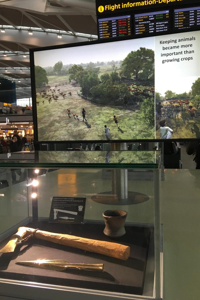 Digital display and artefact cabinet at Terminal 5 Heathrow Airport