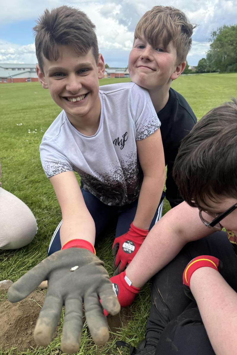Trenchmate sharing his finds discovery from digging an archaeological trench