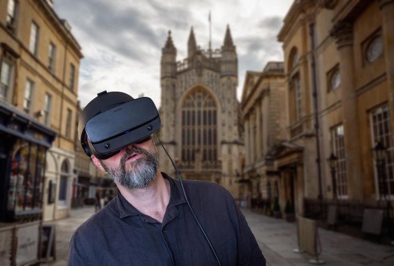 Will Foster, Wessex Archaeology Senior Graphics Officer, using Bath Abbey VR experience