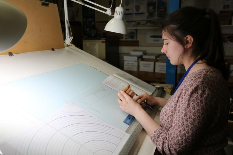 Rachel drawing a pottery sherd