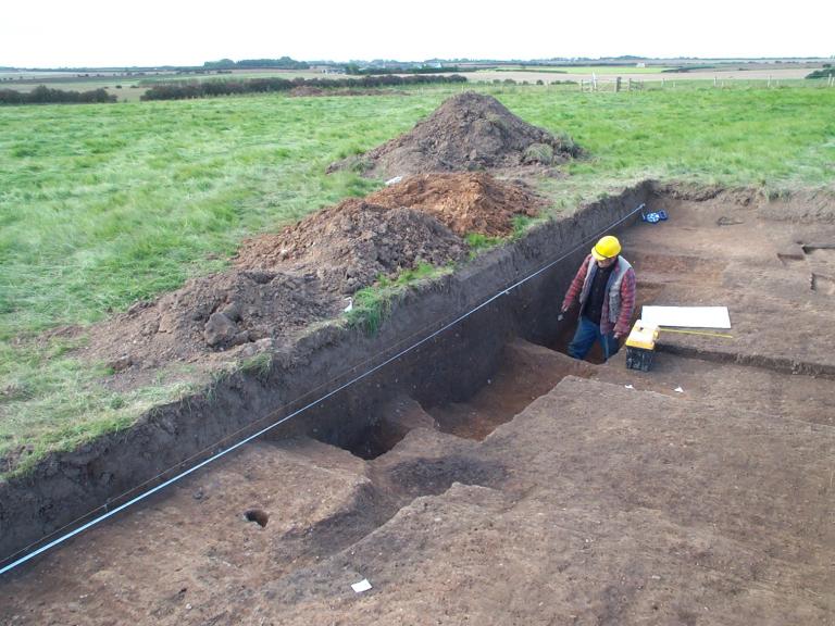 Excavating and recording a trench at Skipsea