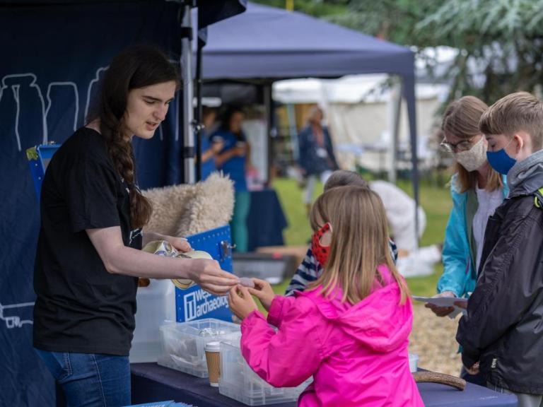 Lizzie Garwood, 2D Animator and Illustrator, interacting with the public at Salisbury Museum