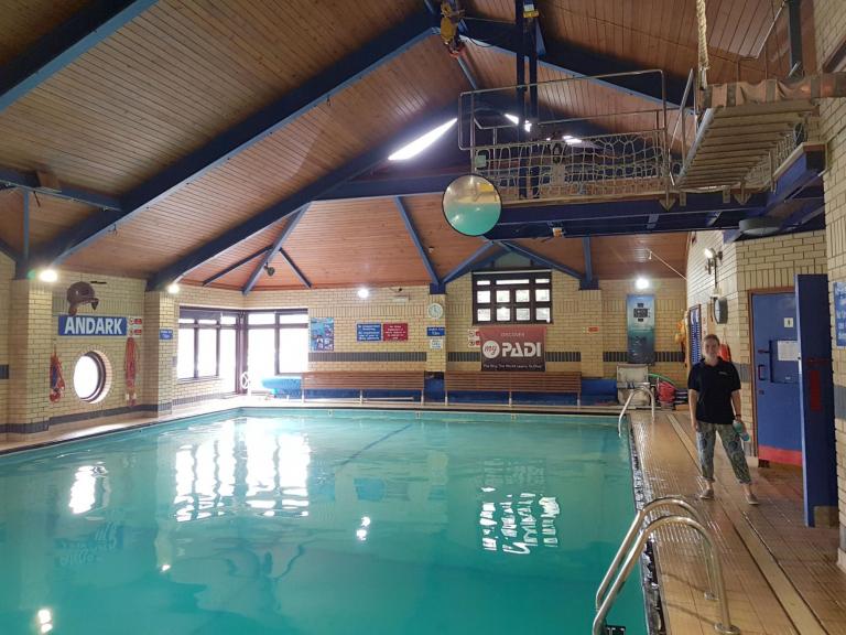 Dani next to the pool