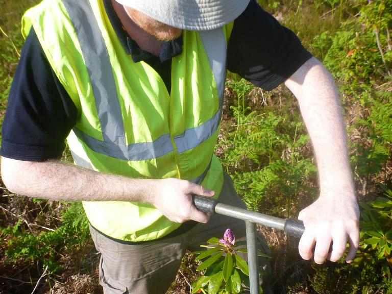 Geoarchaeologist soil sampling