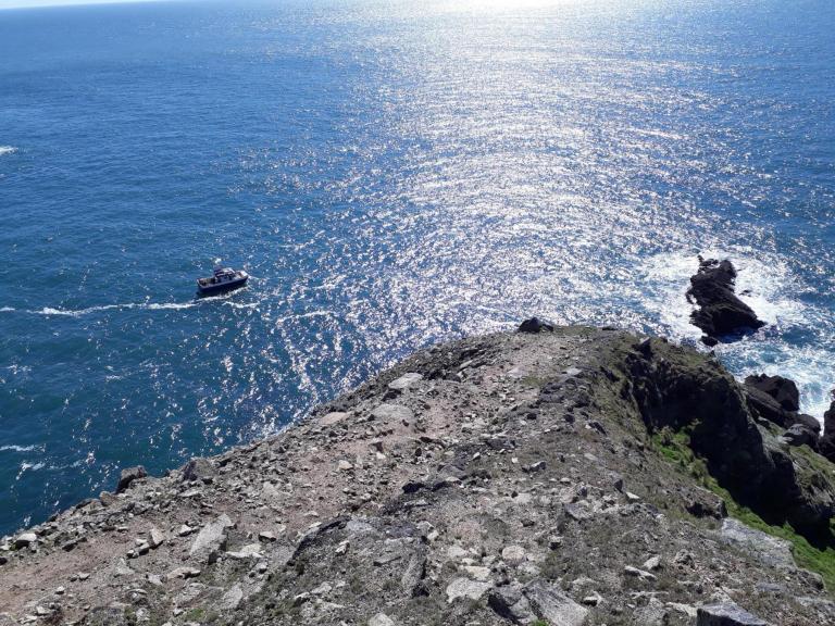 Looking down from the top of the cliffs towards the Montagu Steps and our dive boat Obsession II below