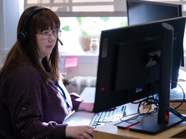 Colleague working at a desk