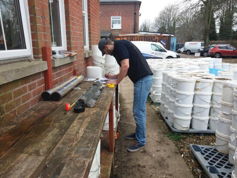 Ryan Killion Student placement examining core samples
