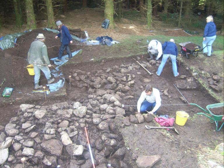 The team excavating a trench