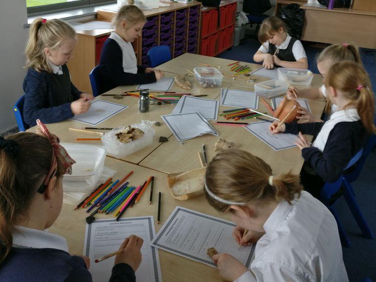 Pupils of Old Sarum Primary School completing worksheets