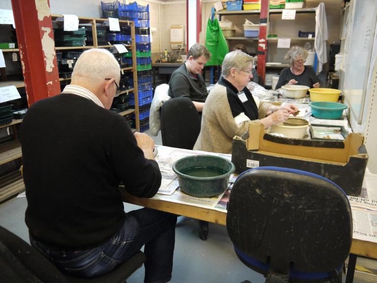 Some of the volunteers cleaning finds
