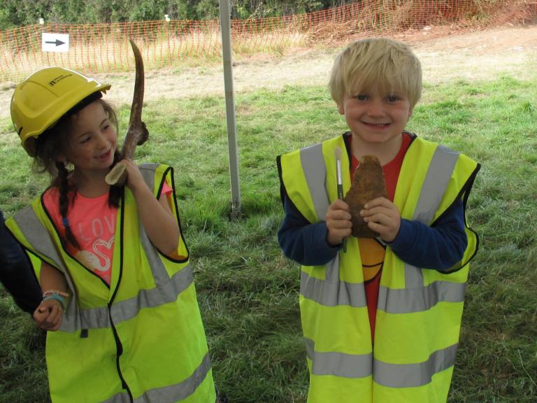 Children engaged in archaeological activities at the Sherford open day