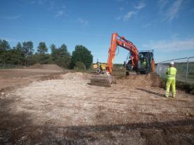 An archaeologist monitoring a digger