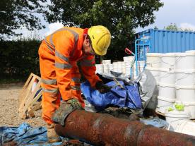 Removing concretion from a cannon recovered from the Nemo Link Interconnector project