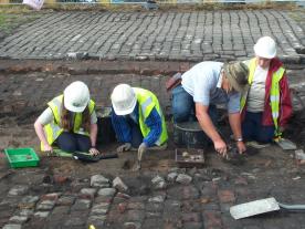 Phil Harding of Time Team working alongside volunteers at Arkwrights Mill Manchester