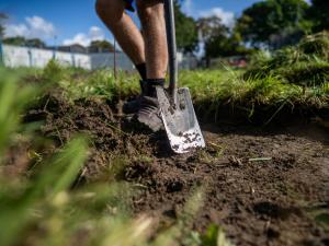 Digging for Erlestoke participant wears steel-toe boots and has their spade ready